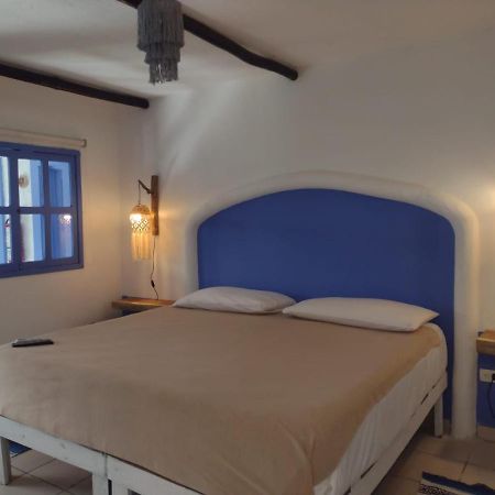 Mio Tulum Hotel Boutique Bagian luar foto A bedroom in a hotel in Tunisia