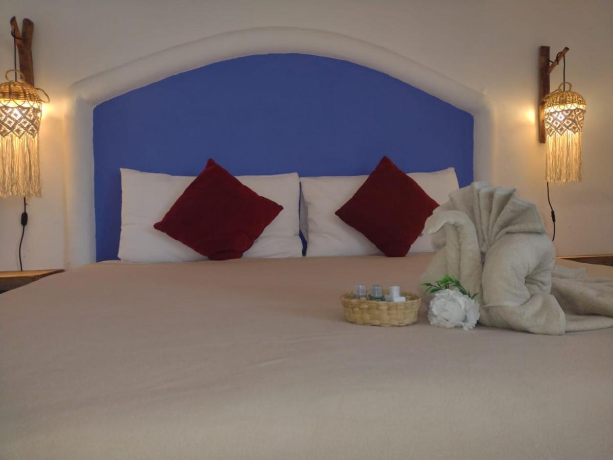 Mio Tulum Hotel Boutique Bagian luar foto A bedroom at the hotel