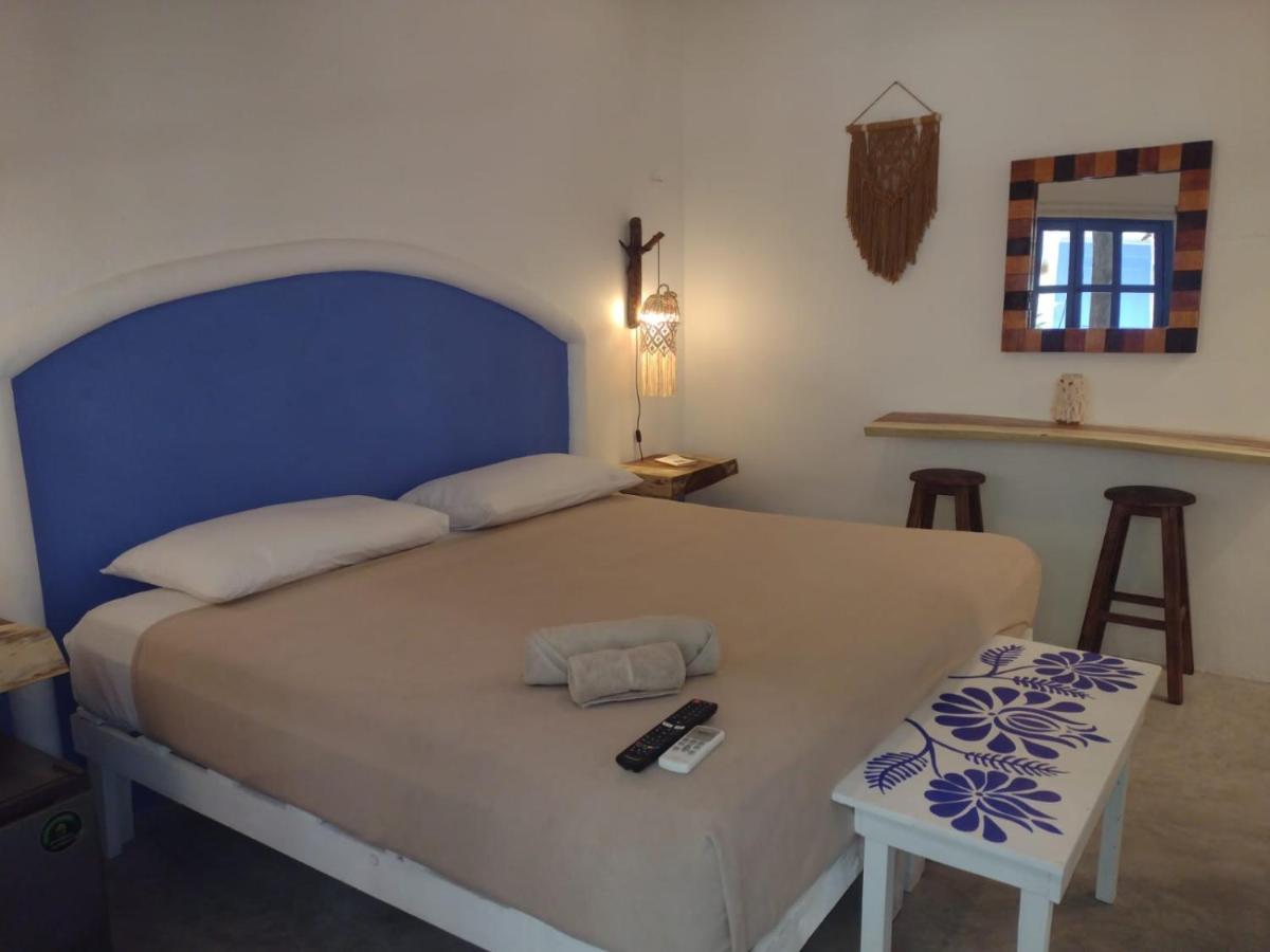 Mio Tulum Hotel Boutique Bagian luar foto A room at the hotel