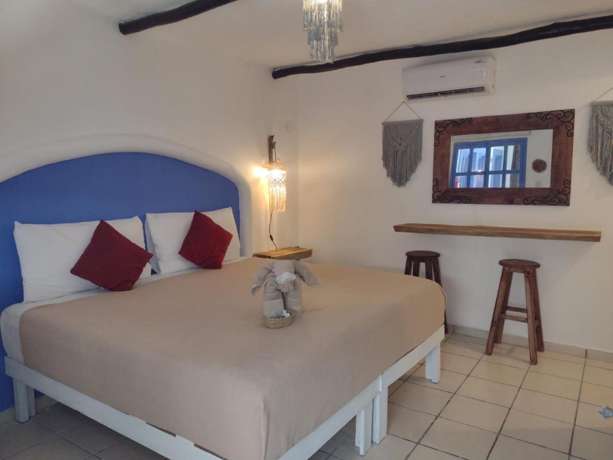 Mio Tulum Hotel Boutique Bagian luar foto A room at the hotel