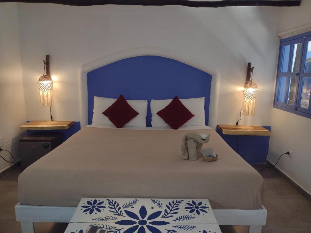 Mio Tulum Hotel Boutique Bagian luar foto A bedroom at the hotel