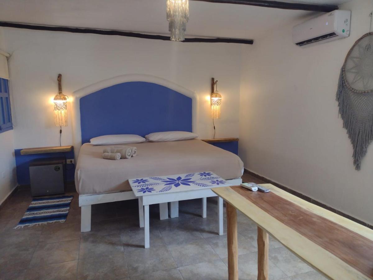 Mio Tulum Hotel Boutique Bagian luar foto A bedroom in the hotel
