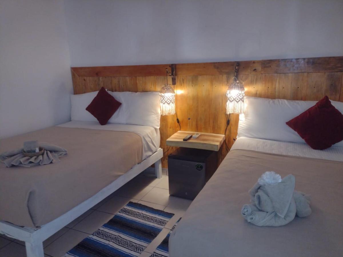 Mio Tulum Hotel Boutique Bagian luar foto A room at the hotel