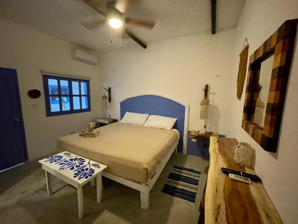 Mio Tulum Hotel Boutique Bagian luar foto A bedroom in a hotel in San Cristóbal de Las Casas, Chiapas, Mexico