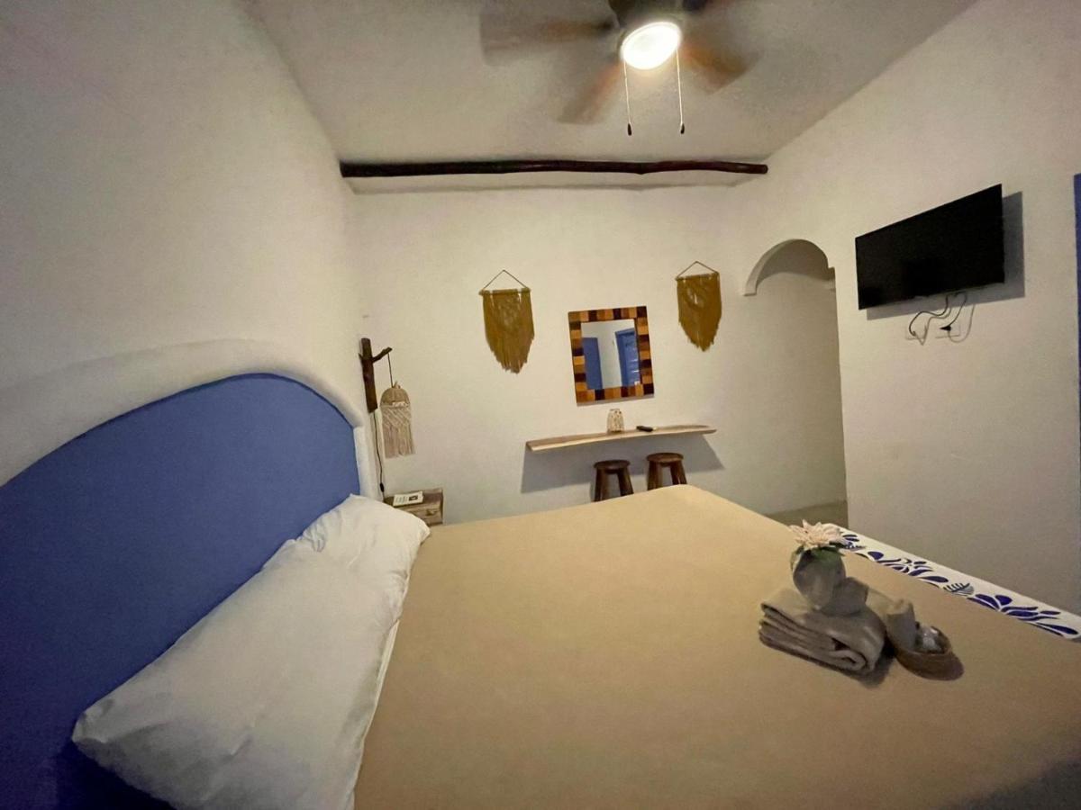 Mio Tulum Hotel Boutique Bagian luar foto A room at the hotel