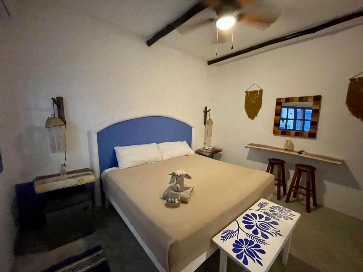 Mio Tulum Hotel Boutique Bagian luar foto A room at the hotel