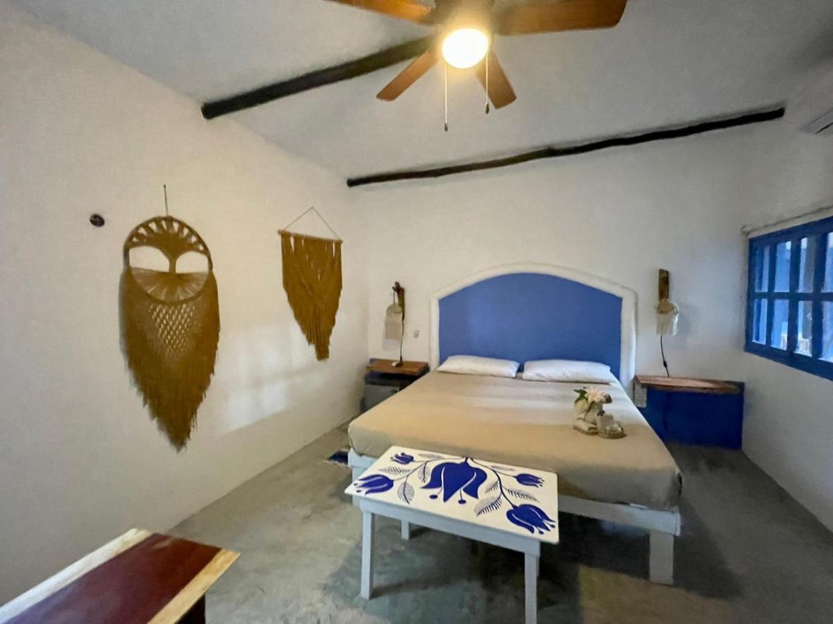 Mio Tulum Hotel Boutique Bagian luar foto A bedroom at the hotel
