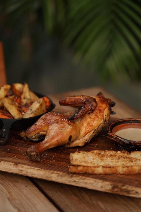 Mio Tulum Hotel Boutique Bagian luar foto A half chicken
